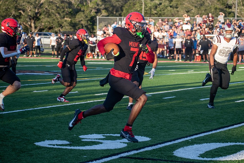 Cardinal Mooney senior Zy'marion Lang returns a fumble for a touchdown against Riverview.