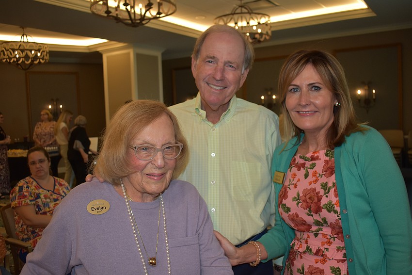Evelyn Zorn, who turns 100 in January, her son Eric Zorn, and Grand Living Executive Director Michelle Orlando.