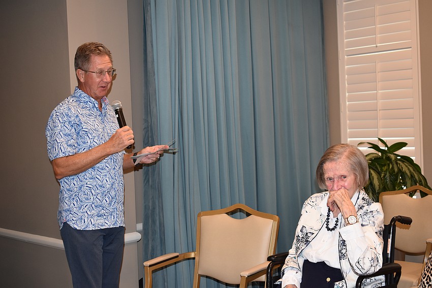Don Patterson tells the crowd that his mom, Ann Patterson is a great mom, cook, housekeeper, photographer, world traveler and party thrower.