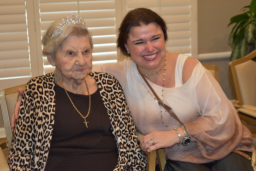 Mary Myers on her 100th birthday Sept. 15 at Grand Living with her granddaughter Karoline Myers Brown.