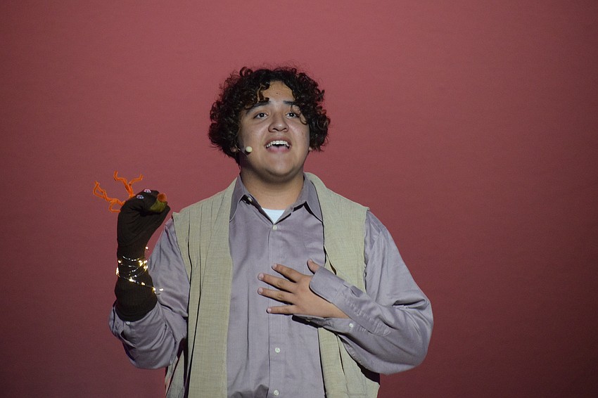 Gabriel Cortes, or in this case Kristoff, sings alongside his reindeer friend, Sven, while singing 