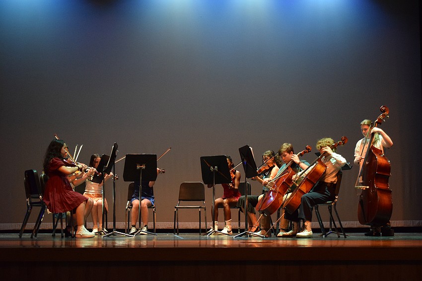 Students perform an orchestral rendition of 