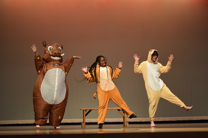 Allee Owen, Ari Smith and Joshua Ogline throw their worries away while performing 