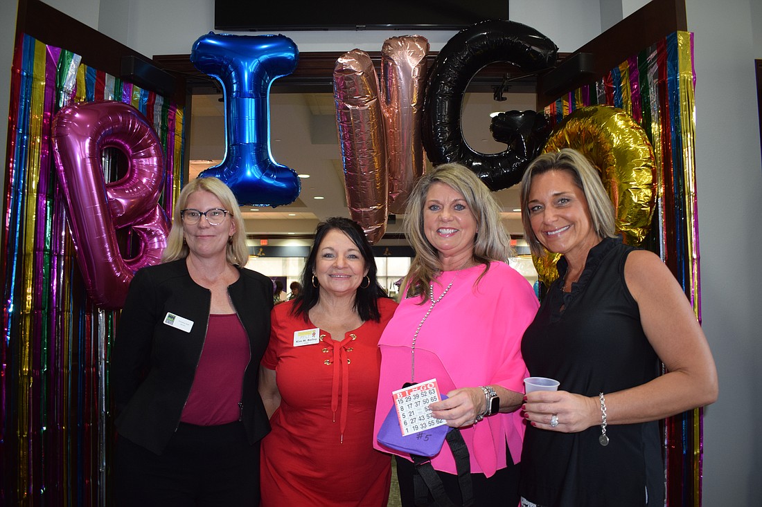 Bradenton's Christina Sisti, Parrish's Kim Bailey, Lakewood Ranch's Peggy Kronus and Sarasota's Tanya Peters are ready for a fun night of playing bingo while raising money for area nonprofits.