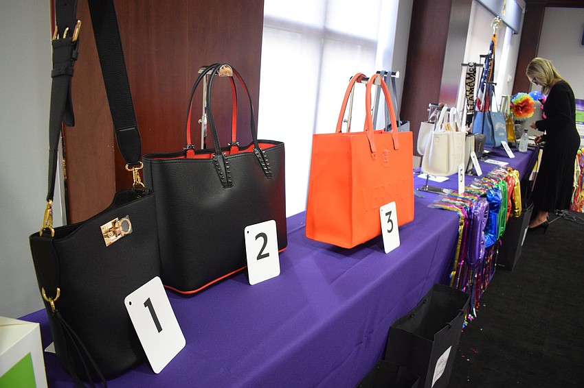 Eleven luxury purses are available as prizes during Sisterhood for Good's annual Designer Bag Bingo.