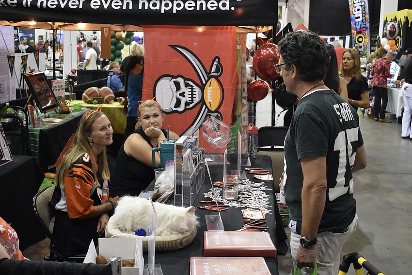 Peyton Davis and Georgia Sanacore of Cat Depot speak with Lakewood Ranch's John Holz.