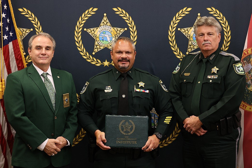 FCSO Cmdr. Bernard Woodward (center) graduated from the FSA Commanders Academy. Photo courtesy of the FCSO