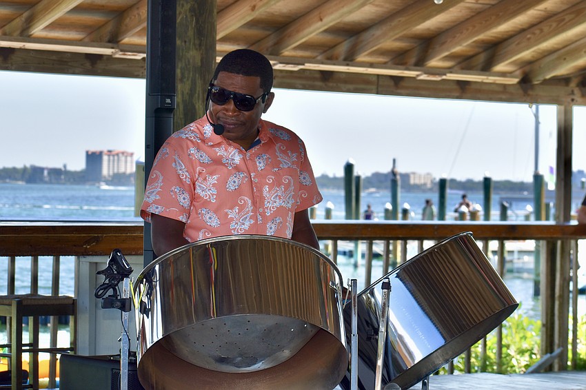 Ephraim Adams of Rhythm Trail provided live music with steel drums and vocals.