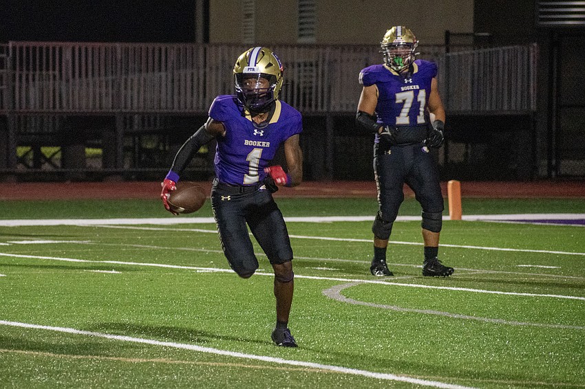 Booker High senior Josiah Booker sprints upfield against Braden River High.