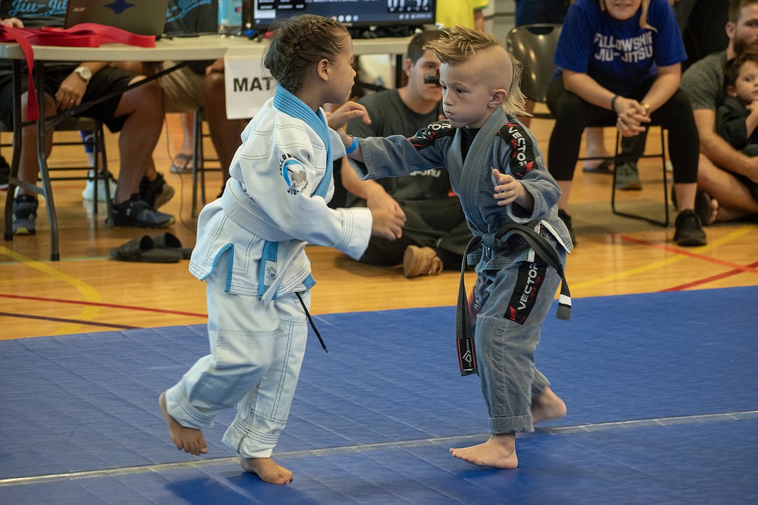 Aayla Bruttell and John Darling face off during the 2023 Sarasota BJJ Open, held Sept. 22 at the Robert L. Taylor Community Complex.