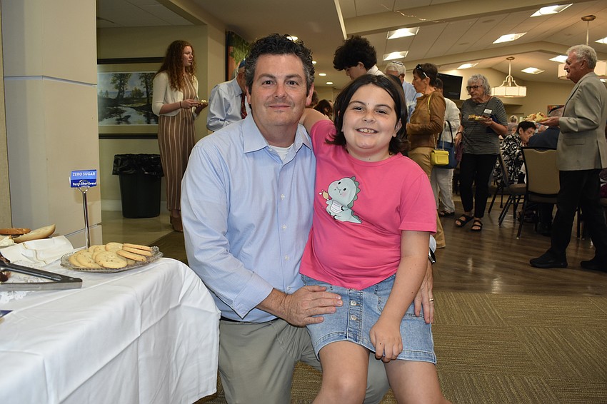 Videographer Jim Ramer and his 9-year-old daughter Arielle Ramer.