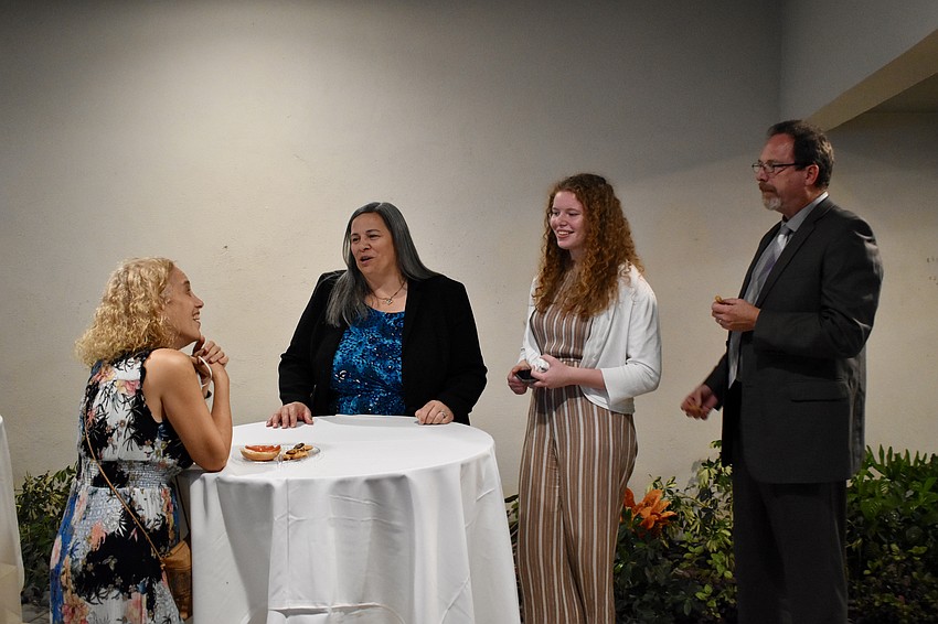 Dori Goldfarb talks with Amy, Gabrielle and David Meese.