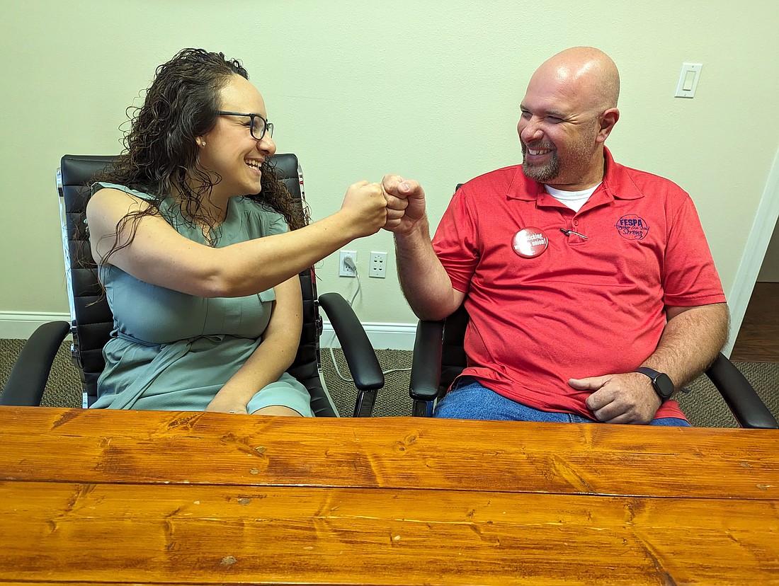 FCEA President Elisabeth Dias and FESPA President Brun Hudson recently negotiated new contracts with the district. Photo by Brent Woronoff