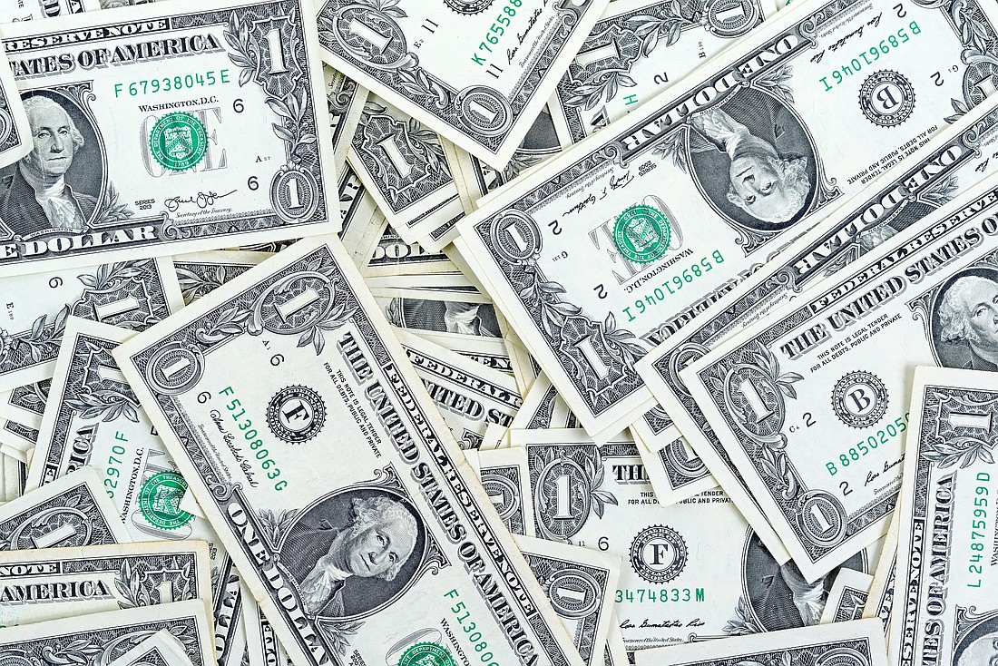 U.S. dollar bills. Photo from Adobe Stock