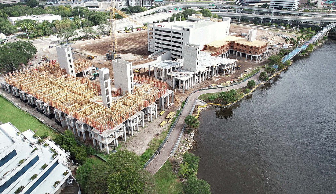 One Riverside is under construction at the former Florida Times-Union campus along the St. Johns River. The development includes apartments, retail and a Whole Foods Market.