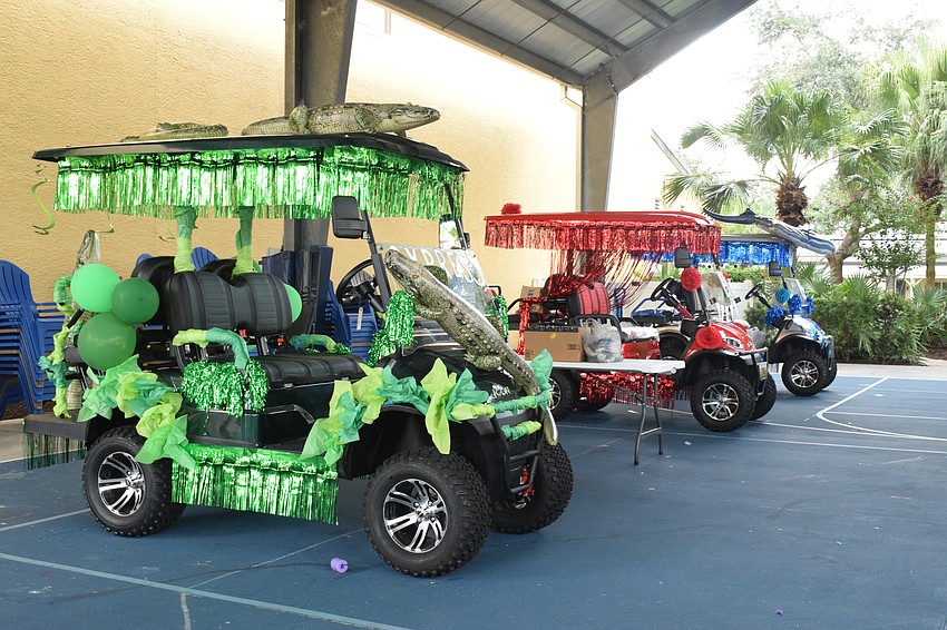 The golf carts almost are ready to make their debut in Out-of-Door Academy's first homecoming parade.