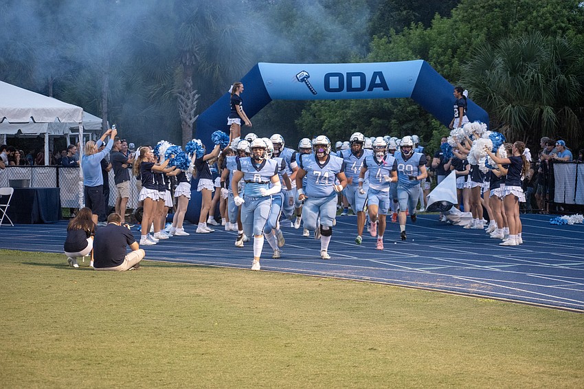 The Thunder football team takes the field against Santa Fe Catholic.