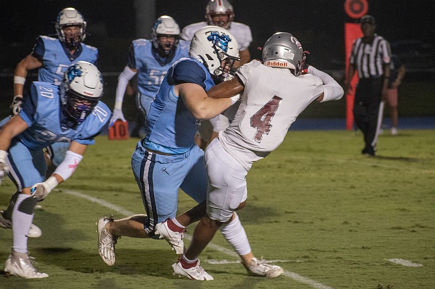 ODA linebacker Charlie Tack puts a hit on Santa Fe receiver Jayden McPherson.