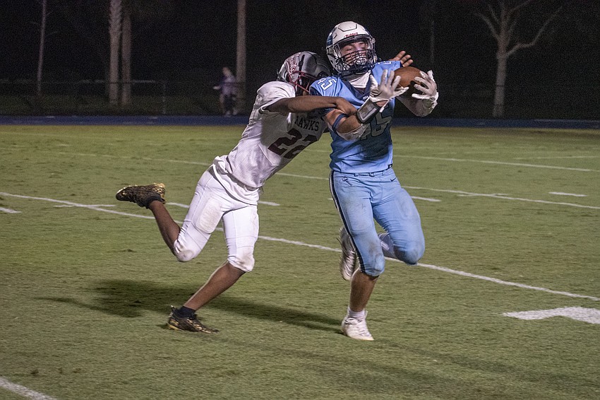 ODA fullback Aengus Doody gets a catch broken up by Santa Fe defensive back Antonio Scarborough.