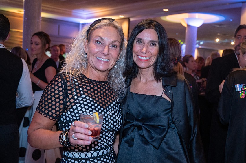 Mette Milland, Lisa McDevitt