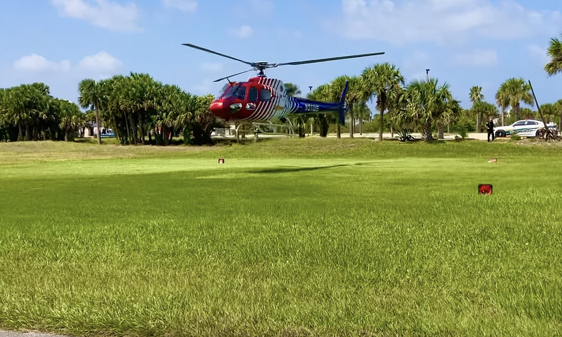 Flagler County FireFlight takes off from the grass lot at Santa Maria del Mar Catholic Church in Flagler Beach. Photo courtesy of the FBPD