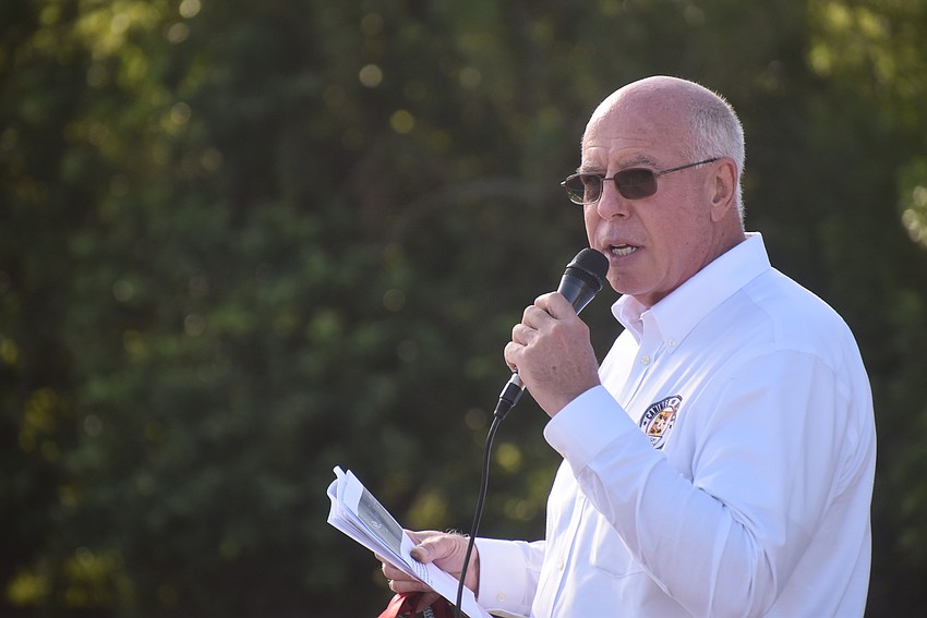 Canines for Heroes founder Mark LaFlamme addresses the crowd at 