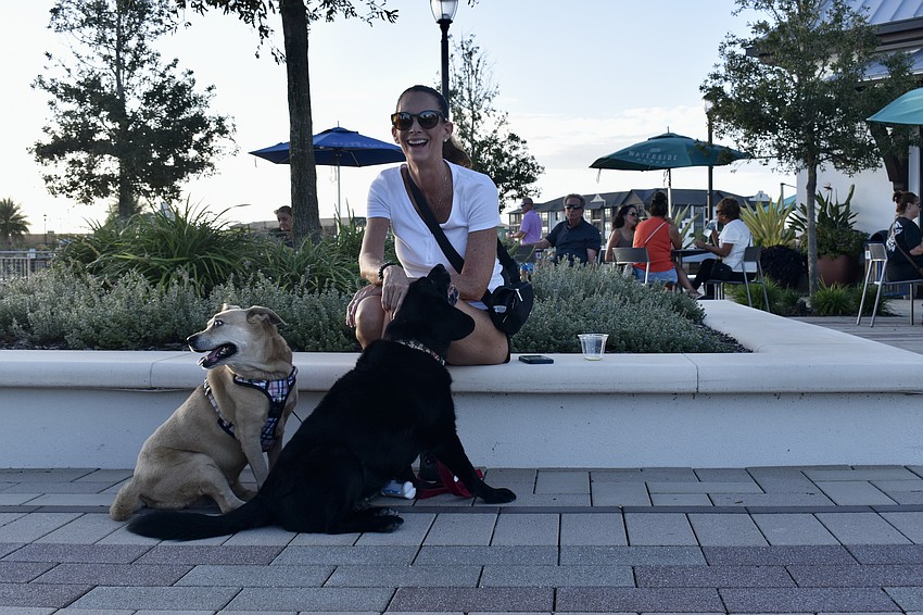 Country Club resident Sandra Aranibar enjoys a girls' night out with Cali and Bella.