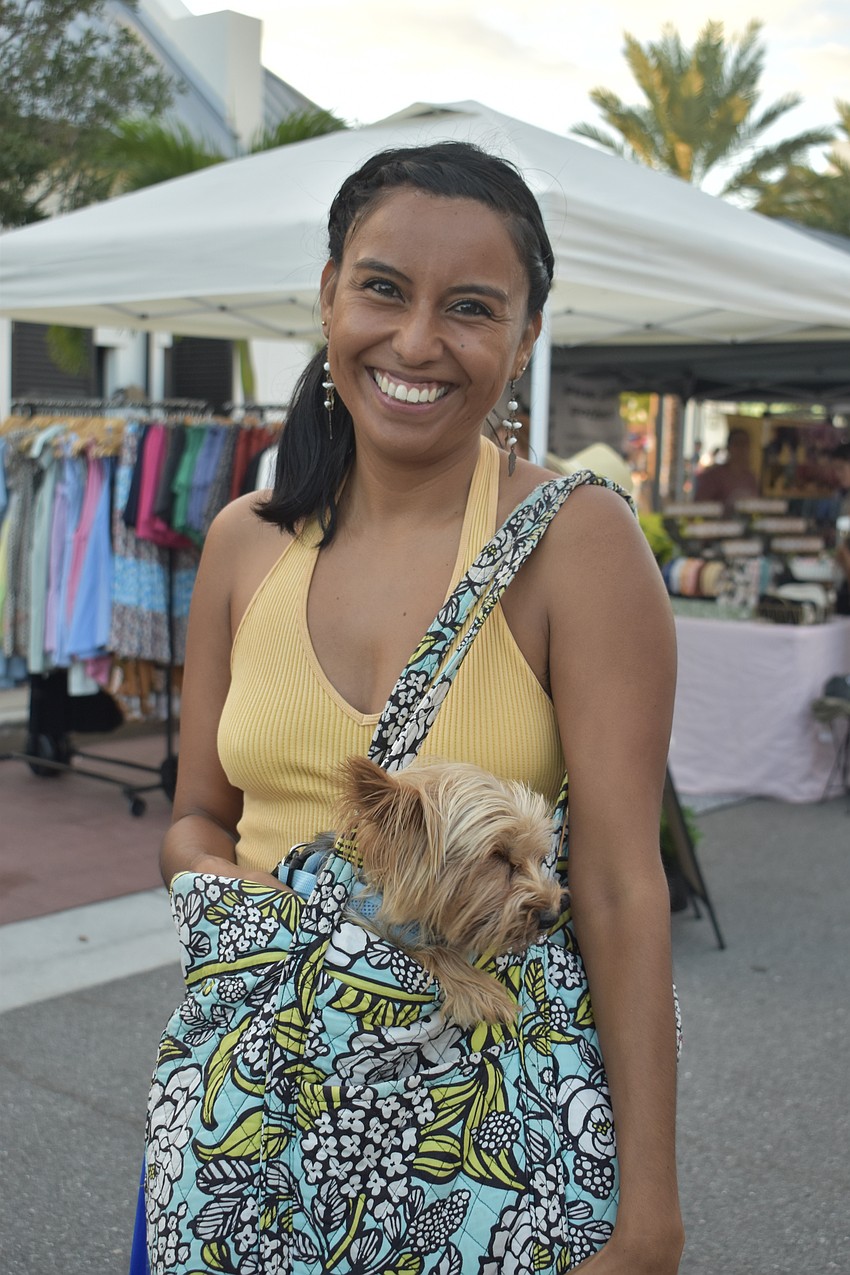 Bradenton resident Veronica Hernandez carries her pooch Chewie in her bag.