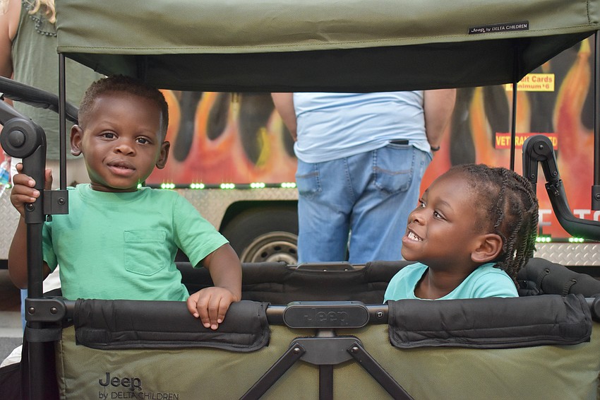 Sarasota residents Zuri and Asani Simmons enjoy Ranch Nite Wednesdays from the comfort of their wagon. This isn't their first spin around, it's their return for the new season.