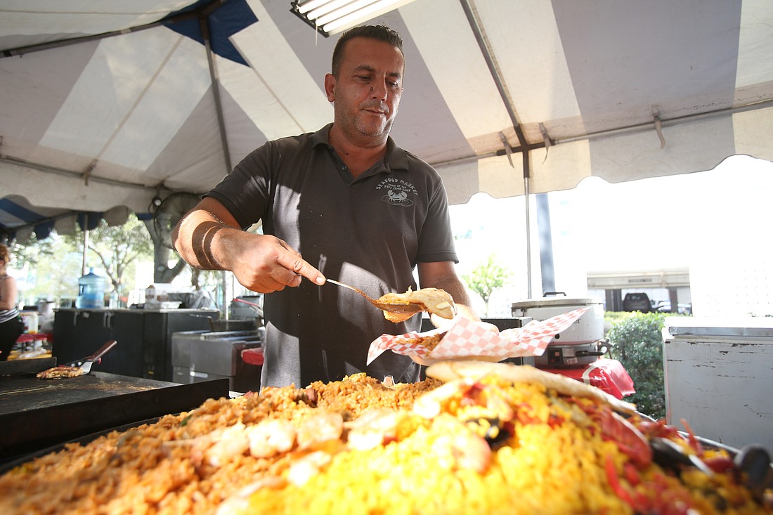 Vele Dadeski serves food at the 2021 Sarasota Rocktoberfest.