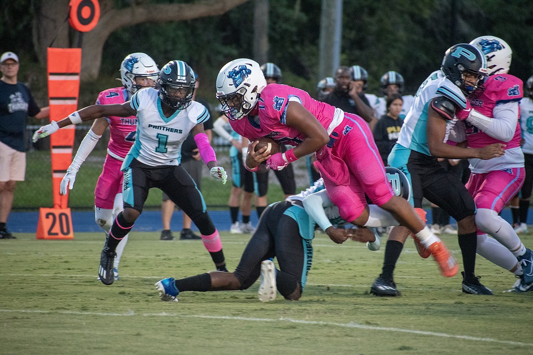 ODA sophomore Allen Clark gets tripped by the Bell Creek defense after a positive gain.