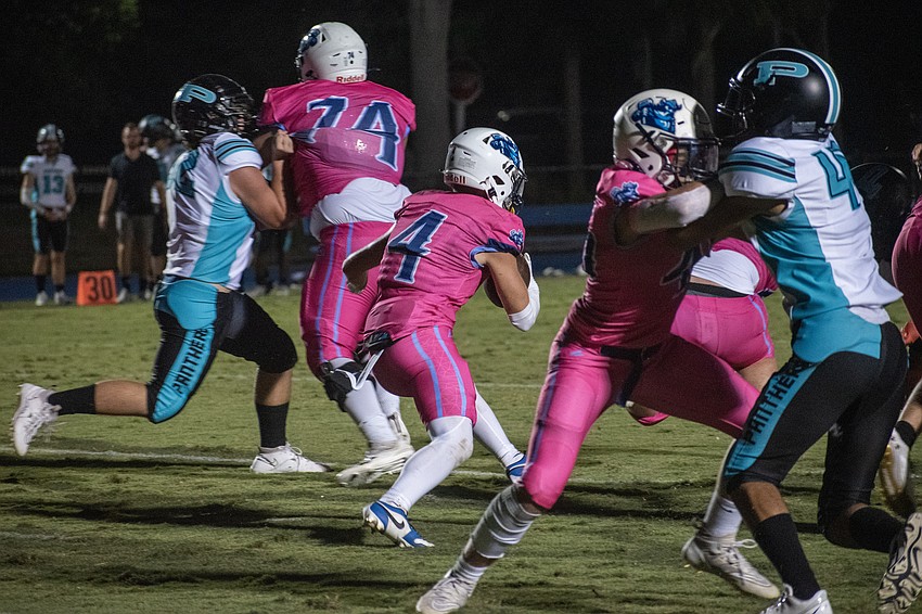ODA senior Jack Meyers cuts through a hole in the Bell Creek defense.