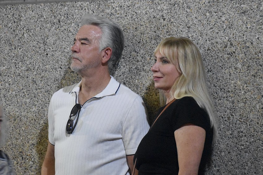 Ric Sutter and Donna Messenger watch the performance.