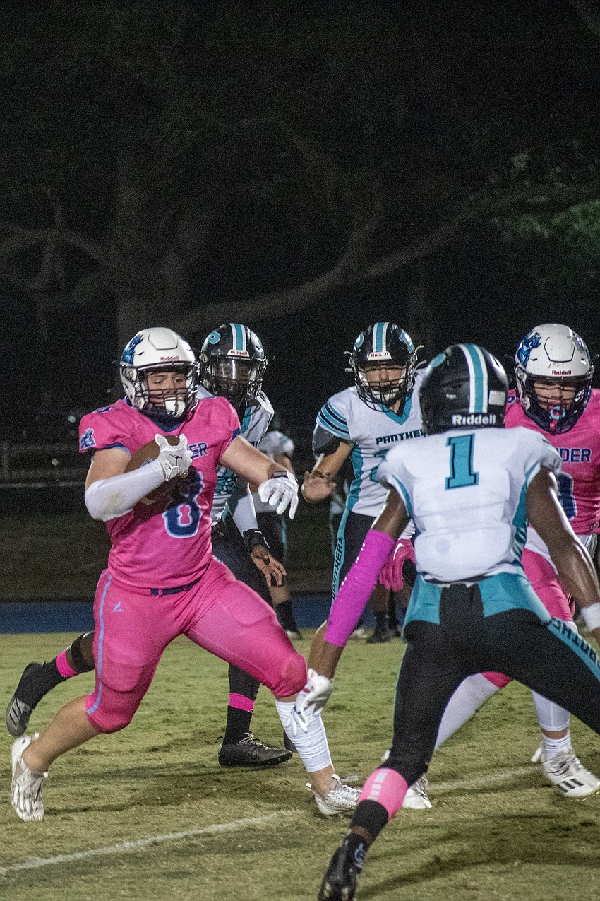 ODA senior Charlie Tack (8) churns up the field against Bell Creek.