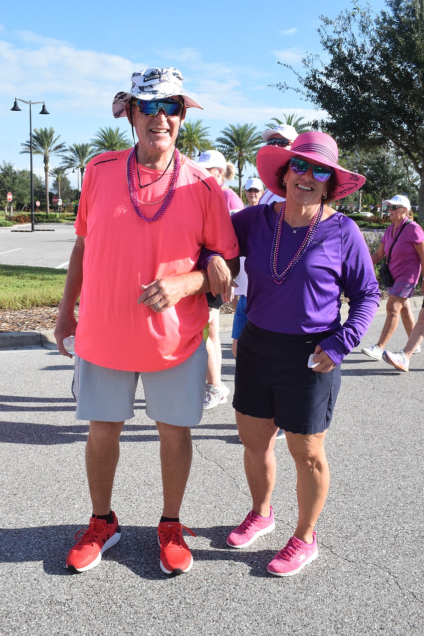 Del Webb's Steve Calobong walks in honor of his mother, Lorraine Calobong, and Victoria Minni walks in honor of her father, Louis Minni. Lorraine Calobong and Louis Minni died of cancer.
