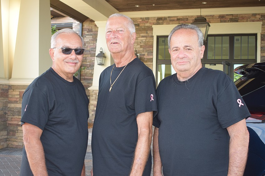 Del Webb's Joe Mazzarese, Rob DiTommaso and Eddie Abdenour donate coffee and donuts to the Del Webb Breast Cancer and Beyond Walk.