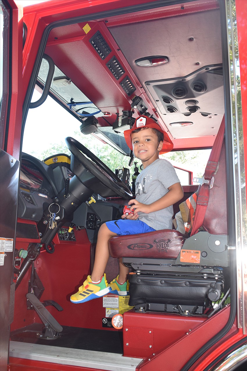 Lakewood Ranch 3-year-old Grayson Cruz sees what it's like driving an East Manatee Fire Rescue truck.