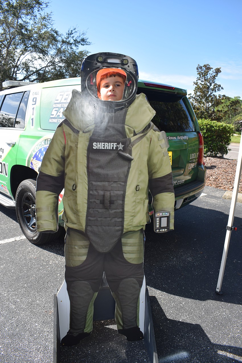 East County's Nikita Poposki sees what he would look like if he were wearing a Manatee County Sheriff's Office bomb suit.