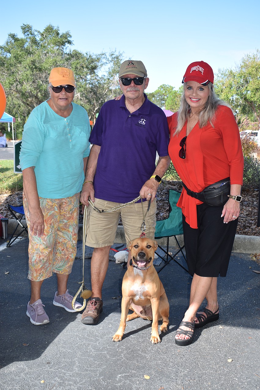 Lakewood Ranch's Patricia Swiatek and her husband, Robert Swiatek, represent Nate's Honor Animal Rescue with their dog, Graham, at Safety Town, which is organized by Summerfield's Laurie Fox.