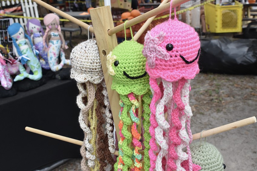 Crochet items are placed on display.