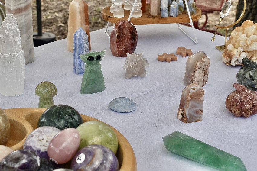 A series of stone items are set out for purchase.