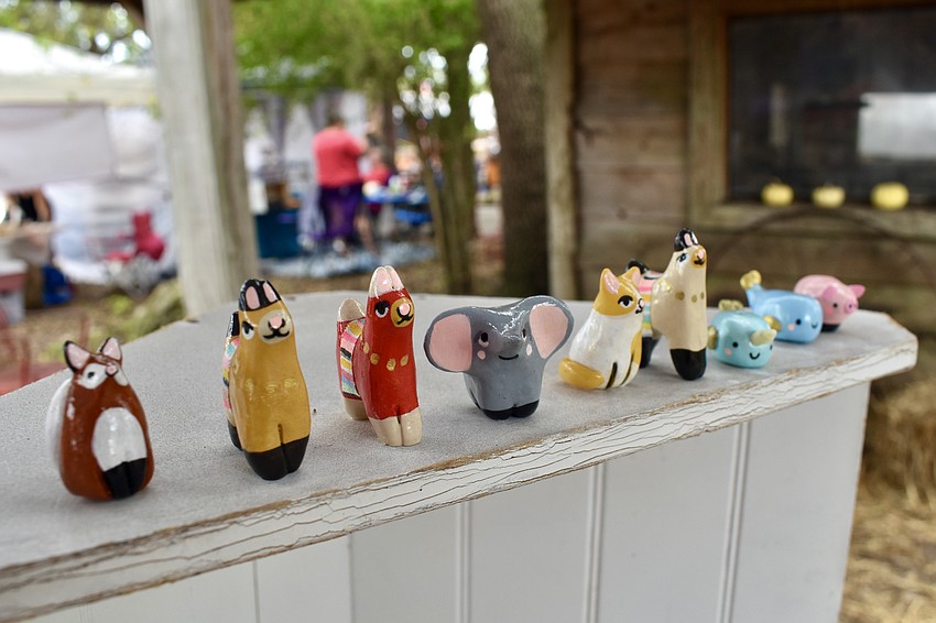 A series of ceramic animals are on sale at the event.
