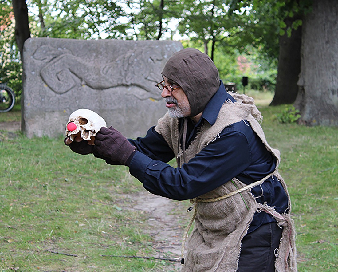 Shakespeare expert Ron Destro performs "Hamlet" outdoors.