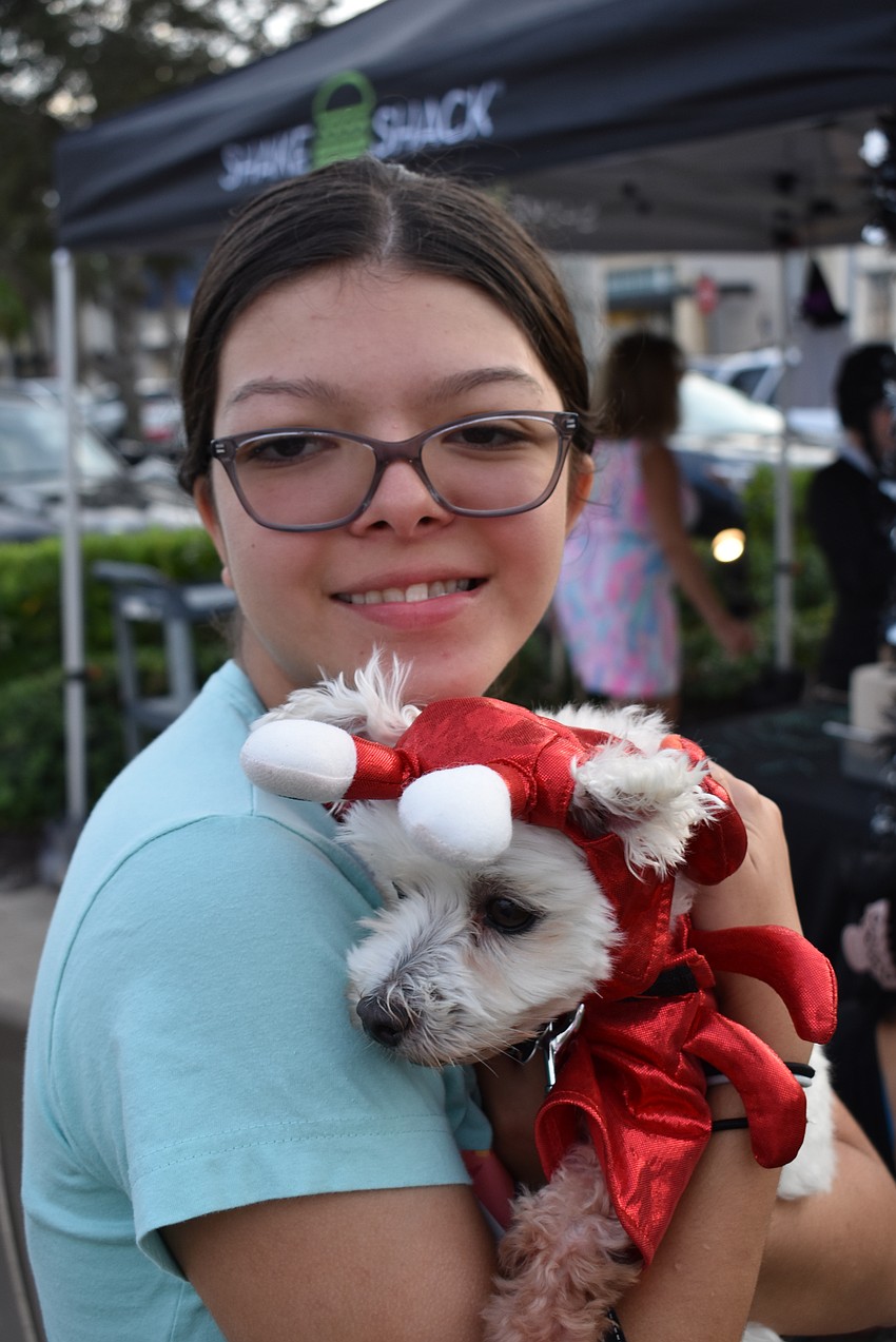 Sarasota's Sofia Monroy shows off 11-year-old Kobe, a Maltipoo, before the contest.