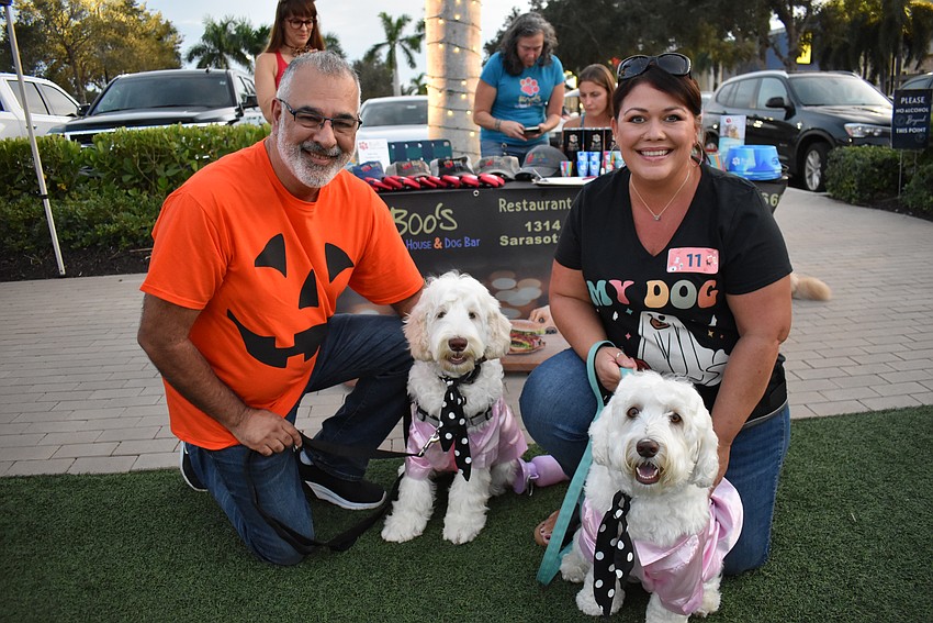 K. Naran and Lindie Naran enjoy Barks and Boos with their Australian labradoodles CoCo and Zoey.