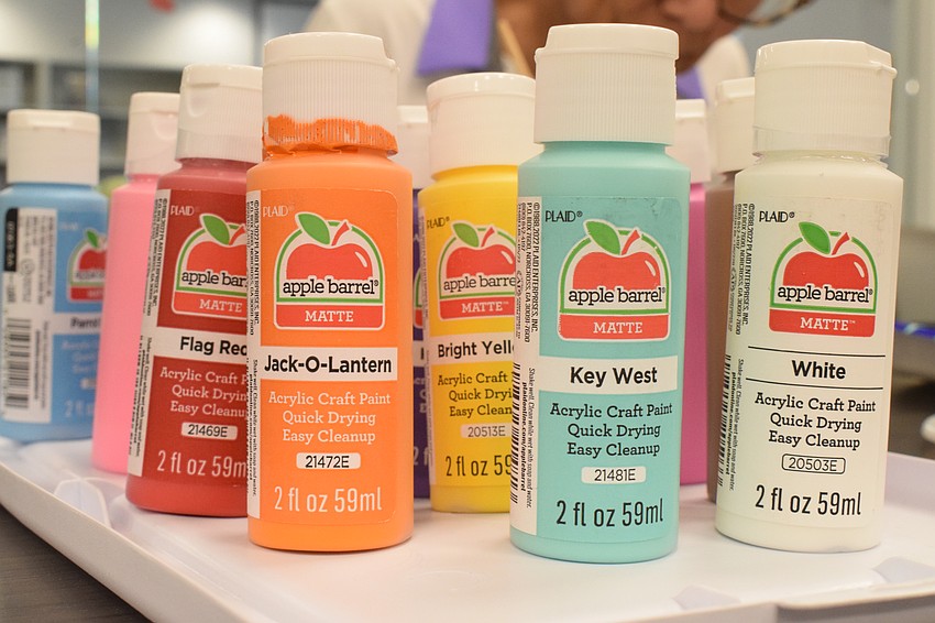 An assortment of colors are available for participants to use on their rocks.