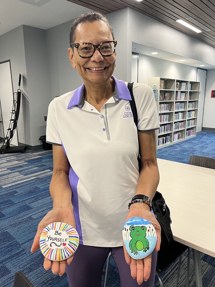 East County's Sonya Bacon shows off her completed rocks.