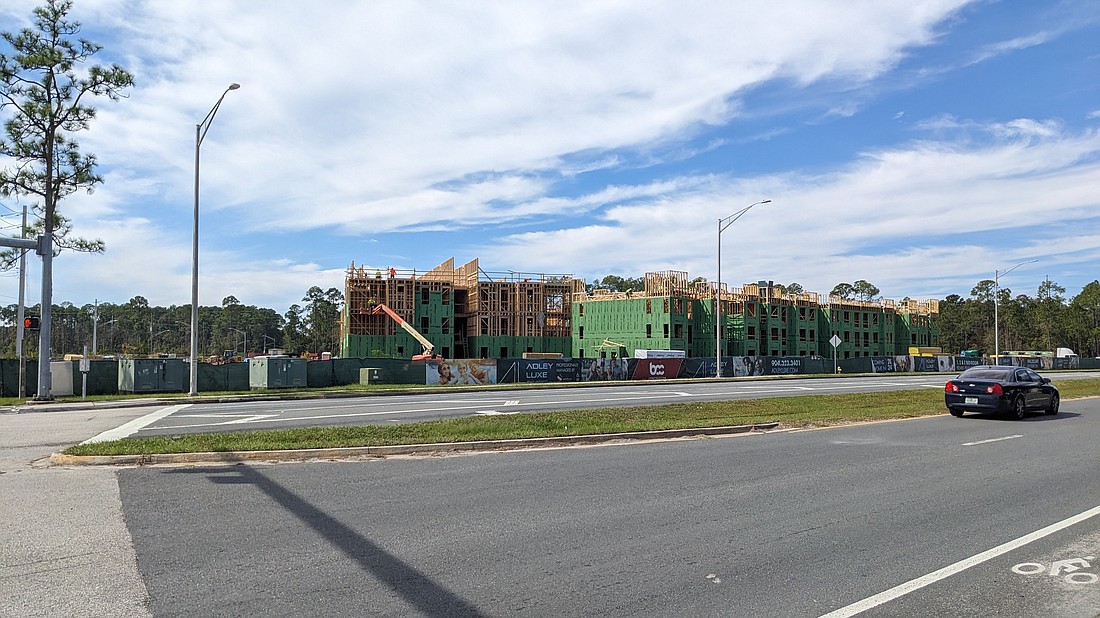 The Adley Luxe apartment community under construction Oct. 9 at 665 Starratt Road at Airport Center Drive in North Jacksonville. According to Yardi Matrix, area developers had 14,631 apartment units under construction through July