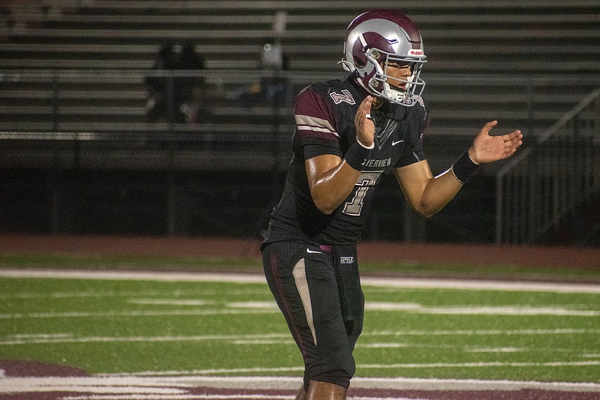 Rams senior quarterback Braxton Thomas claps to signal for a snap against CAI.