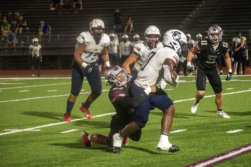Rams junior Landon Marsters makes a tackle against CAI.
